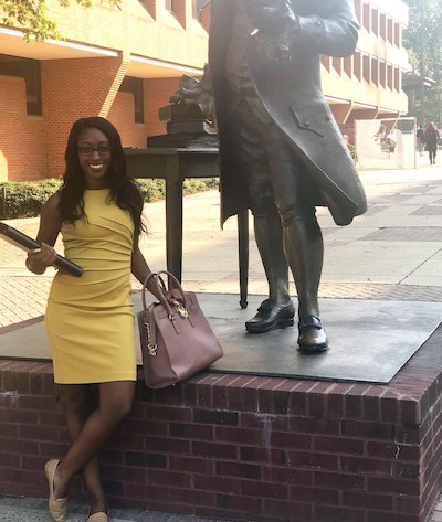 woman with mason statue